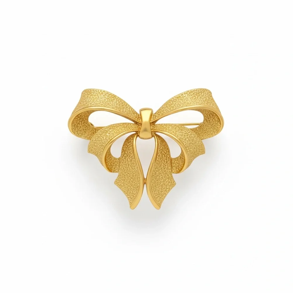 Vintage Sarah Coventry Gold Tone Bow Brooch Shimmery Signed
